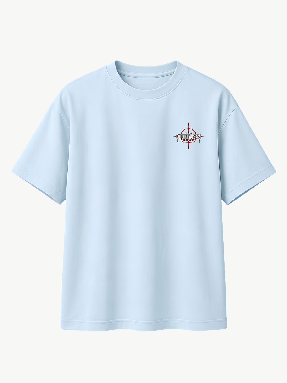 Hellblaues VYFINITY Heavy T-Shirt mit 215 GSM in Frontansicht, Oversized-Passform und kleinem „THE QUIET ONES KNOW“-Brustprint in Schwarz, Weiß und Rot.