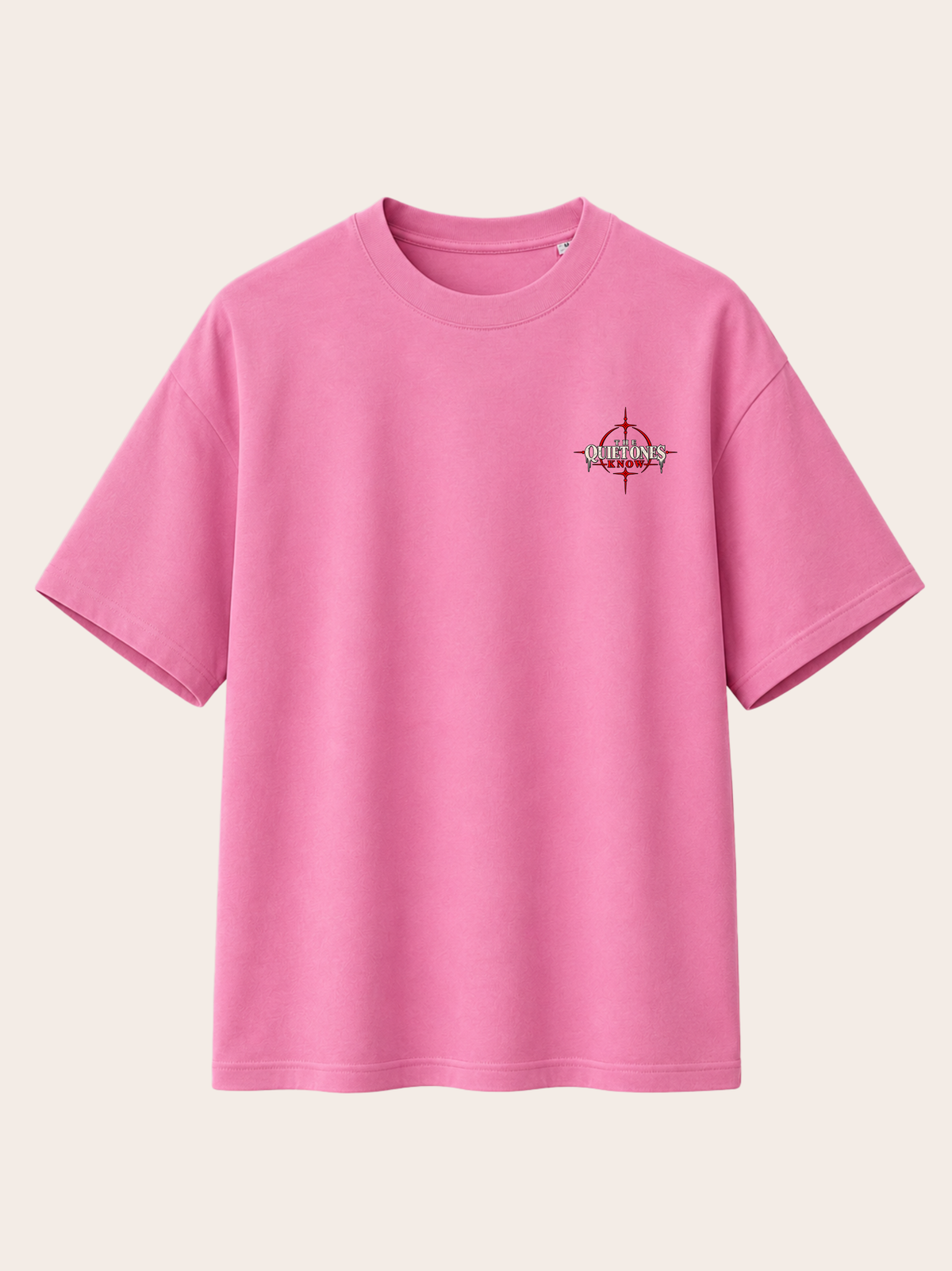 Pinkes VYFINITY Heavy T-Shirt mit 215 GSM in Frontansicht, Oversized-Passform und kleinem „THE QUIET ONES KNOW“-Brustprint mit markanten roten und dunklen grafischen Akzenten.