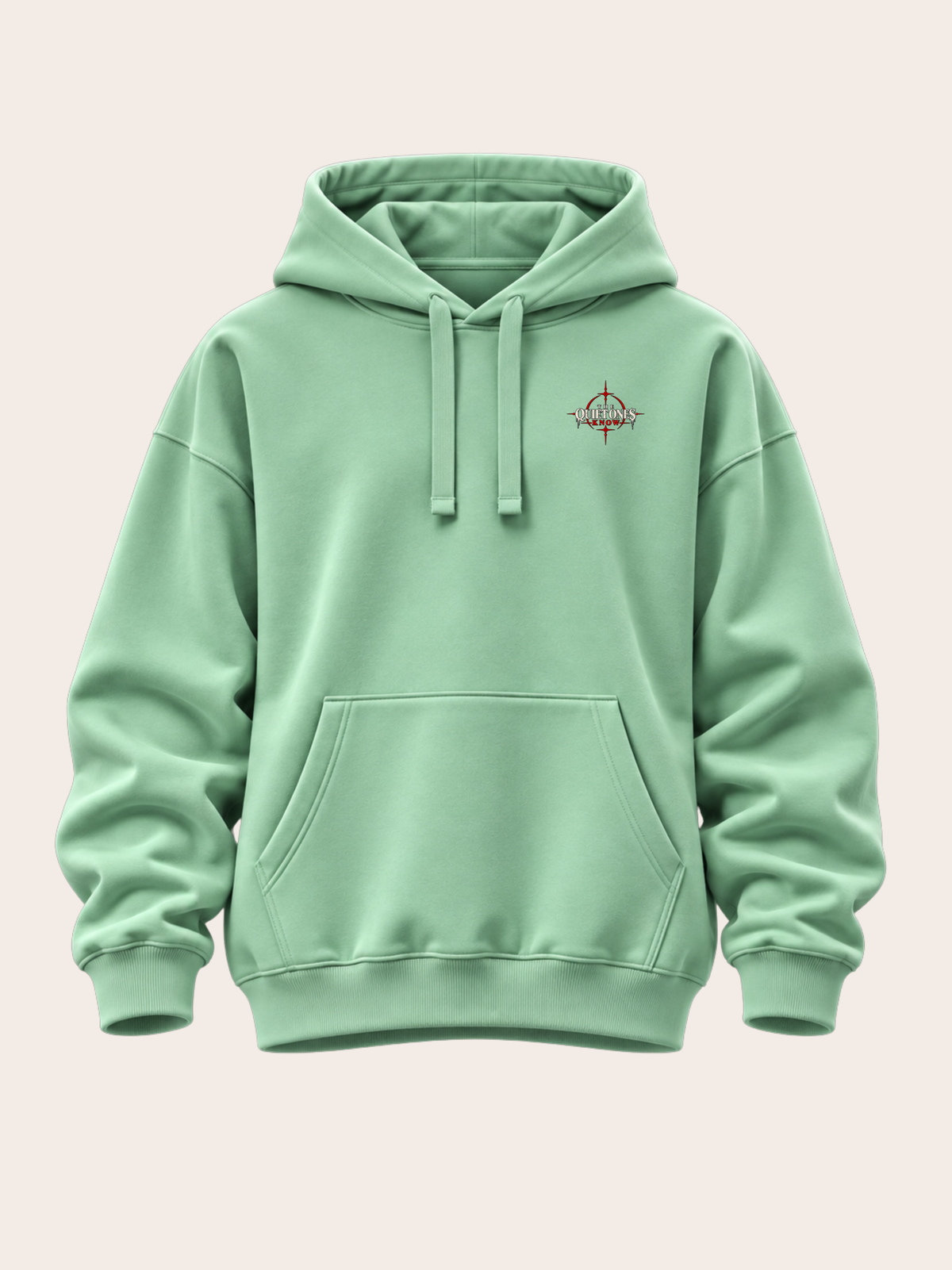 Mintgrüner Oversized Hoodie mit Kapuze, Kängurutasche und kleinem THE QUIET ONES KNOW Brustprint in Schwarz, Weiß und Rot.